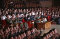 北朝鮮・平壌（Pyongyang）で開催された「牡丹峰楽団（Moranbong Band）」の公演を鑑賞する金正恩（キム・ジョンウン、Kim Jong-Un）第1書記（中央列の左から5人目）と李雪主（リ・ソルジュ、Ri Sol-Ju）夫人（同列の左から4人目、2014年4月16日撮影、同20日配信）。(c)AFP/KCNA via KNS