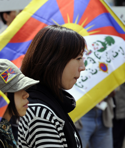 北京五輪の聖火、長野に到着 法輪功も抗議活動