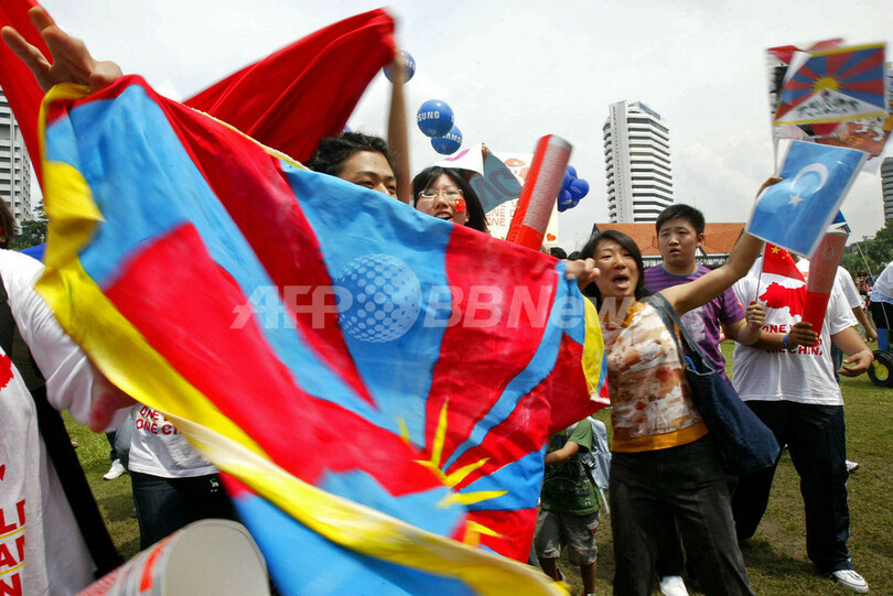 マレーシア警察、五輪聖火リレーで日本人家族を保護