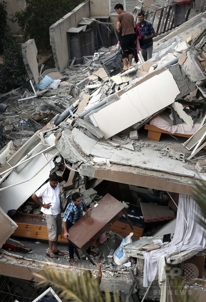 ミサイル着弾で集合住宅倒壊、18人負傷 ガザ