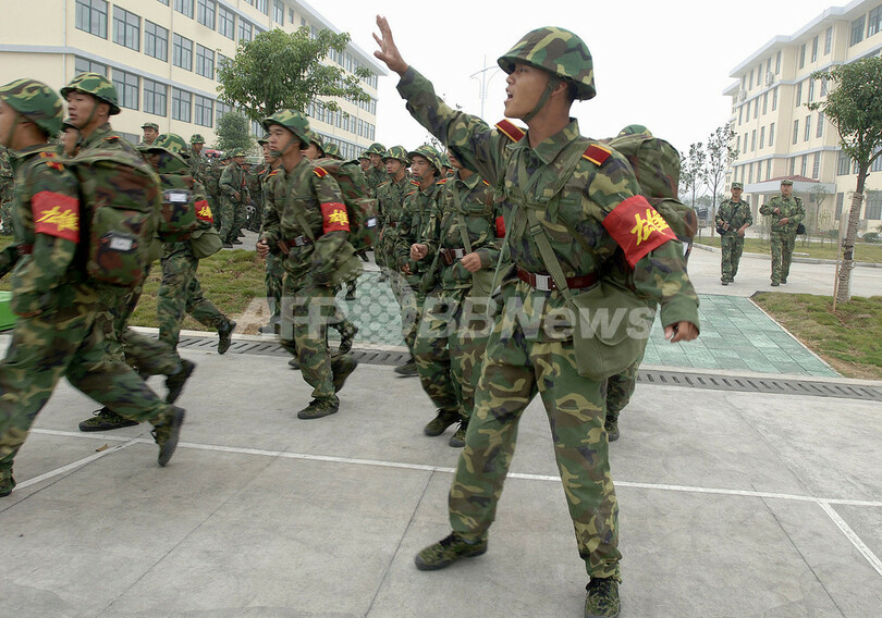 中国の胡国家主席が人民解放軍を掌握か