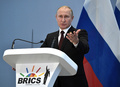 南アフリカのヨハネスブルクで開催された新興5か国（BRICS）首脳会議で、記者会見を開いたロシアのウラジーミル・プーチン大統領（2018年7月27日撮影）。(c)AFP PHOTO / SPUTNIK / Alexey NIKOLSKY