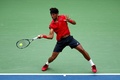 全米オープンテニス、男子シングルス1回戦。リターンを狙うジョアン・ソウザ（2015年8月31日撮影）。(c)AFP/Getty Images/Clive Brunskill