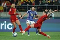 サッカー女子W杯オーストラリア・ニュージーランド大会、グループC、日本対スペイン。パスを出す遠藤純（中央、2023年7月31日撮影）。(c)Marty MELVILLE / AFP