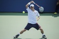 テニス、全米オープン（The US Open Tennis Championships 2014）男子シングルス1回戦。リターンを打つ錦織圭（Kei Nishikori、2014年8月26日撮影）。(c)AFP/Kena Betancur