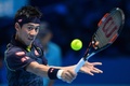男子テニス、ATPワールドツアー・ファイナル5日目。リターンを狙う錦織圭（2015年11月19日撮影）。(c)AFP/GLYN KIRK