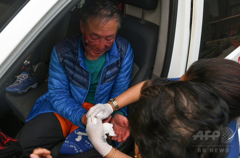 両脚切断の中国人登山家、ついにエベレスト登頂 5度目の挑戦で