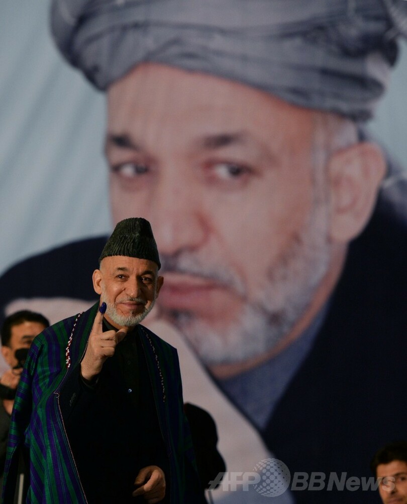 アフガニスタン大統領選、厳戒のなか投票 初の民主的政権交代へ