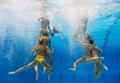 スペイン・バルセロナ（Barcelona）で開催されている第15回世界水泳選手権（15th FINA World Championships）。水中カメラで撮影されたシンクロナイズドスイミング・チームの演技の様子。

チームテクニカルルーティン（TR）予選で演技するスペインの選手（2013年7月20日撮影）。(c)AFP/FRANCOIS XAVIER MARIT