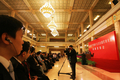 2007年10月14日、北京（Beijing）の人民大会堂（Great Hall of the People）で、記者会見を取材する報道陣。(c)AFP/Frederic J. BROWN
