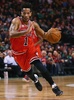 15-16NBA、ボストン・セルティックス対シカゴ・ブルズ。ドライブを仕掛けるシカゴ・ブルズのデリック・ローズ（2015年12月9日撮影）。(c)AFP/Getty Images/Maddie Meyer