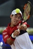 テニス、マドリード・オープン、男子シングルス準々決勝。リターンを打つ錦織圭（2015年5月8日撮影）。(c)AFP/JAVIER SORIANO