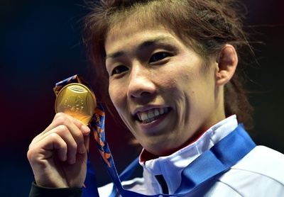 吉田沙保里が女子55キロ級で金メダル、アジア大会