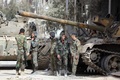 シリア政権軍の兵士ら。ダマスカス近郊の東グータで（2018年3月21日撮影）。(c)AFP PHOTO