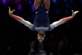 第52回世界体操競技選手権、女子団体決勝。平均台の演技に臨む米国のシャイリース・ジョーンズ（2023年10月4日撮影）。(c)Lionel BONAVENTURE / AFP