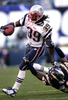 写真は、ボールを運ぶペイトリオッツのRBローレンス・マロニー（%%Laurence Maroney%%）。(c)AFP/Getty Images Stephen Dunn