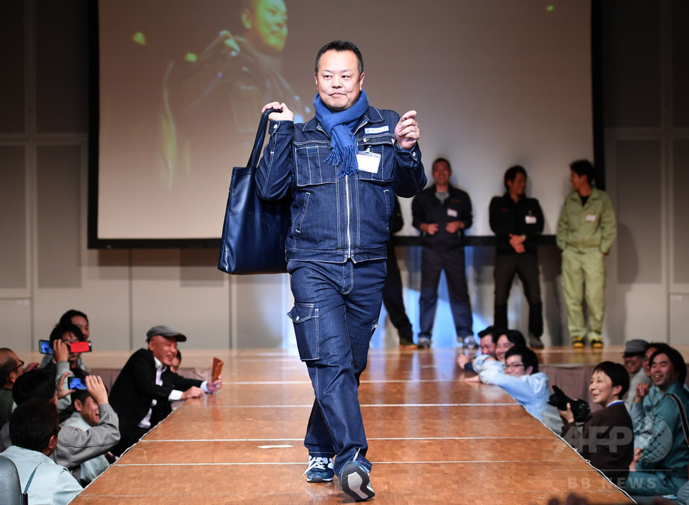 作業着はかっこいい！電気工事士たちがファッションショー開催 東京 写真16枚 国際ニュース：AFPBB News