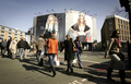 写真は16日、英国・ロンドン市内の街中に貼られた「M by Madonna」の広告。(c)AFP/SHAUN CURRY