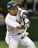 第3回ワールド・ベースボール・クラシック（2013 World Baseball Classic、WBC）は12日、東京で2次ラウンドの1位決定戦が行われ、大会3連覇を狙う日本は10-6でオランダを下し、2次ラウンド首位通過を決めた。

2回に適時打を放つ日本の松田宣浩（Nobuhiro Matsuda、2013年3月12日撮影）。(c)AFP/KAZUHIRO NOGI