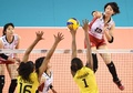 女子バレーボール・ワールドグランプリ（FIVB World Grand Prix 2014）決勝ラウンド最終日、日本対ブラジル。スパイクを打つ石井優希（Yuki Ishii、2014年8月24日撮影）。(c)AFP/KAZUHIRO NOGI