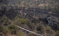 パキスタン北部カイパル・パクトゥンクワ州で、パキスタン航空機の墜落現場を封鎖する兵士（2016年12月8日撮影）。(c)AFP/AAMIR QURESHI