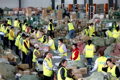 中国 今年の宅配便の業務量、83日間で200億件超