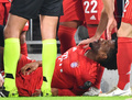 サッカー欧州チャンピオンズリーグ、グループB第6節、バイエルン・ミュンヘン対トッテナム・ホットスパー。膝を負傷したバイエルン・ミュンヘンのキングスレイ・コマン（2019年12月11日撮影）。(c)Peter Kneffel / dpa / AFP
