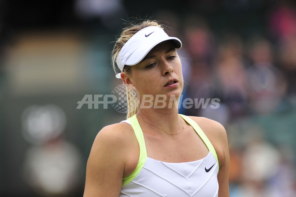 シャラポワが4回戦でリシキに敗れる、ウィンブルドン選手権 写真15枚