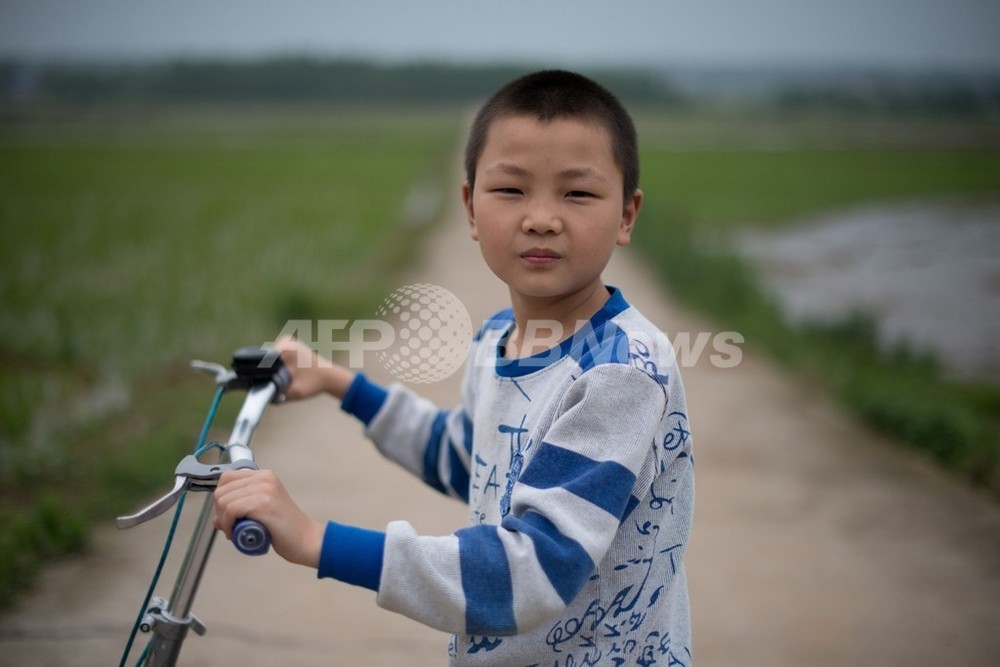 中国、親の出稼ぎで6100万人が「留守児童」に 写真4枚 国際ニュース