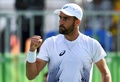 リオデジャネイロ五輪、テニス男子シングルス準々決勝。ポイントを奪いガッツポーズを見せるスティーブ・ジョンソン（2016年8月12日撮影）。(c)AFP/Martin BERNETTI