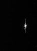 土星探査機カッシーニ（Cassini）が撮影した、地球と月の写真。明るい点が地球、その左下の更に小さな点が月（2013年7月19日撮影）。(c)AFP/NASA/JPL-Caltech/SSI