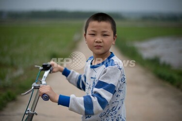 中国、親の出稼ぎで6100万人が「留守児童」に 写真4枚 国際ニュース
