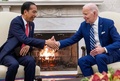 米ホワイトハウスでインドネシアのジョコ・ウィドド大統領（左）と会談するジョー・バイデン大統領（2023年11月13日撮影）。(c)SAUL LOEB / AFP