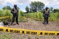 中米ニカラグアの首都マナグア（Managua）で、隕石（いんせき）が落下したとみられる現場を警備する兵士。同国大統領府提供（2014年9月7日撮影）。(c)AFP/PRESIDENCIA - EL 19 DIGITAL - GERMAN MIRANDA