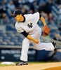 14MLB、ニューヨーク・ヤンキース（New York Yankees）対ボルチモア・オリオールズ（Baltimore Orioles）。先発登板したニューヨーク・ヤンキースの田中将大（Masahiro Tanaka、2014年4月9日撮影）。(c)AFP/Getty Images/Jim McIsaac