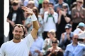 テニス、ウィンブルドン選手権、男子シングルス4回戦。勝利を喜ぶロマン・サフィウリン（2023年7月9日撮影）。(c)SEBASTIEN BOZON / AFP