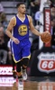 15-16NBA、ユタ・ジャズ対ゴールデンステイト・ウォリアーズ。ドリブルでボールを運ぶゴールデンステイト・ウォリアーズのステフェン・カリー（2015年11月30日撮影）。(c)AFP/Getty Images/George Frey