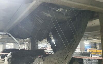 韓国・地下駐車場の天井崩落、作業員2人けが