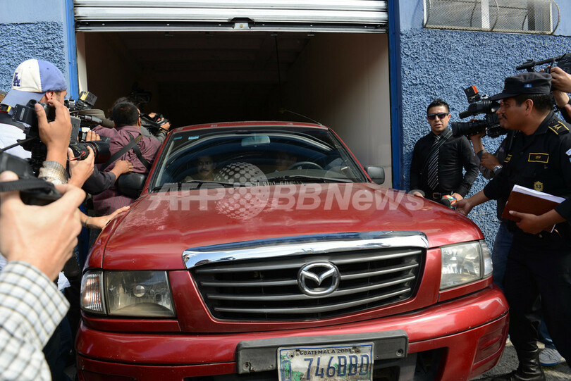 マカフィー容疑者、米国に送還 体験を「映画にする」とコメント