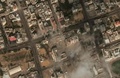 イスラエル軍の攻撃を受け破壊されたガザ地区のワタンタワーを捉えた衛星画像。米宇宙技術会社マクサー・テクノロジーズ提供（2023年10月10日撮影）。(c)AFP PHOTO / Satellite image ©2023 Maxar Technologies