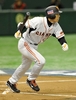 第2回ワールド・ベースボール・クラシック（%%2009 World Baseball Classic%%）強化試合、読売ジャイアンツ（%%Yomiuri Giants%%）対韓国。1回に2点適時二塁打を放つ読売ジャイアンツの李承ヨプ（%%Lee Seung-Youp%%、イ・スンヨプ）。試合は3-0で韓国が敗れた。（2009年3月3日撮影）(c)AFP/TORU YAMANAKA
