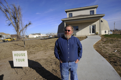 米国社会のモデルとなるか、竜巻で壊滅した町の「エコ都市」再建への取り組み