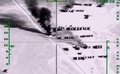 ロシア国防省が公式ウェブサイトで公開した、シリア国内でイスラム過激派組織「イスラム国（IS）」の石油を運搬するタンクローリーを空爆したとされる映像より（2015年11月18日公開）。(c)AFP/RUSSIAN DEFENCE MINISTRY