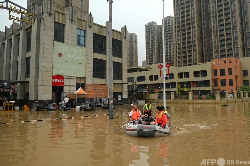 中国中部豪雨、死者51人に