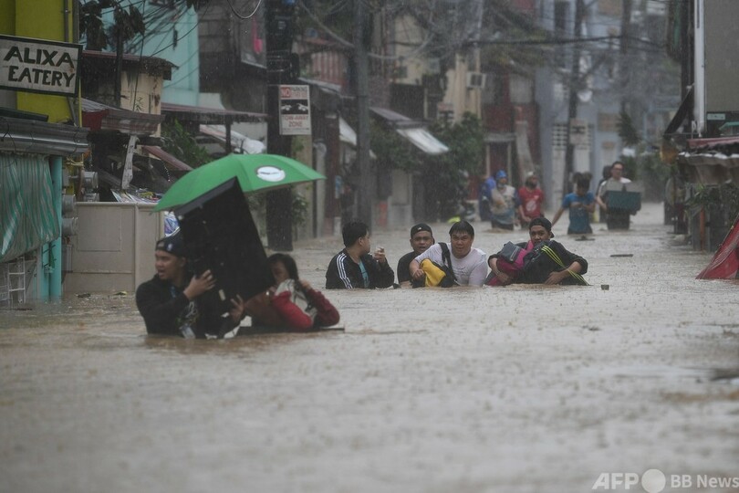 台風22号がフィリピン直撃 首都マニラで大洪水 写真9枚 国際ニュース Afpbb News