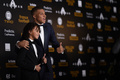フランス・リーグ1、パリ・サンジェルマンのキリアン・エムバペ（右）と弟のエタン君（2018年12月3日撮影）。(c)Anne-Christine POUJOULAT / AFP