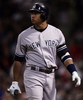 写真は、三振を喫してベンチに戻るヤンキースのアレックス・ロドリゲス（%%Alex Rodriguez%%）。(c)AFP/Getty Images Elsa
