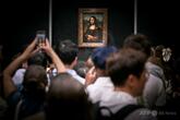 仏ルーブル「モナリザ」展示室に自画像貼り付け ドイツ人の男2人逮捕