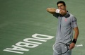 ドバイ・テニス選手権（Dubai Duty Free Tennis Championships 2014）、男子シングルス準決勝。ポイントを奪われ落胆した様子をみせるノバク・ジョコビッチ（Novak Djokovic、2014年2月28日撮影）。(c)AFP/MARWAN NAAMANI