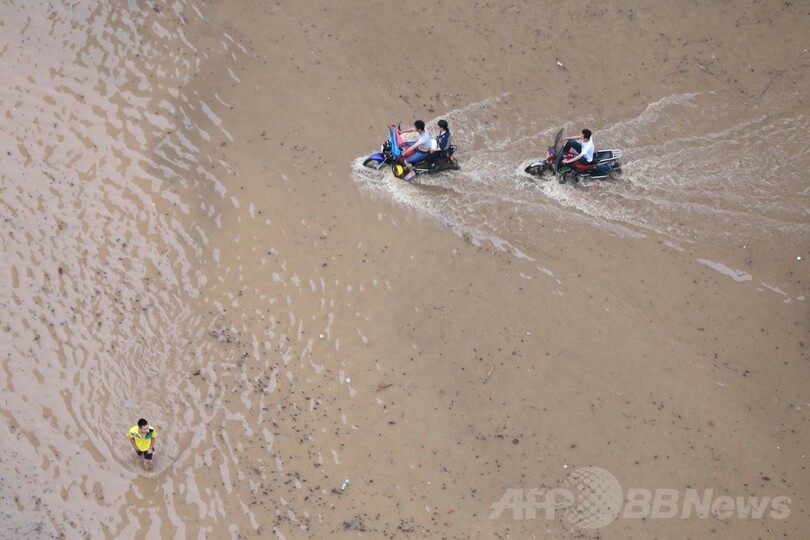 中国の暴風雨で26人死亡、10人不明